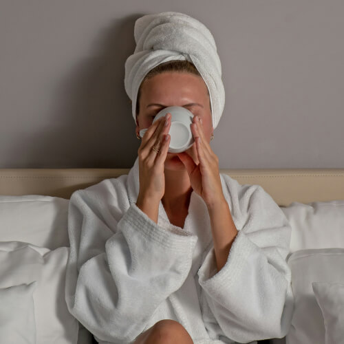 Lot Hotel - Woman with coffee